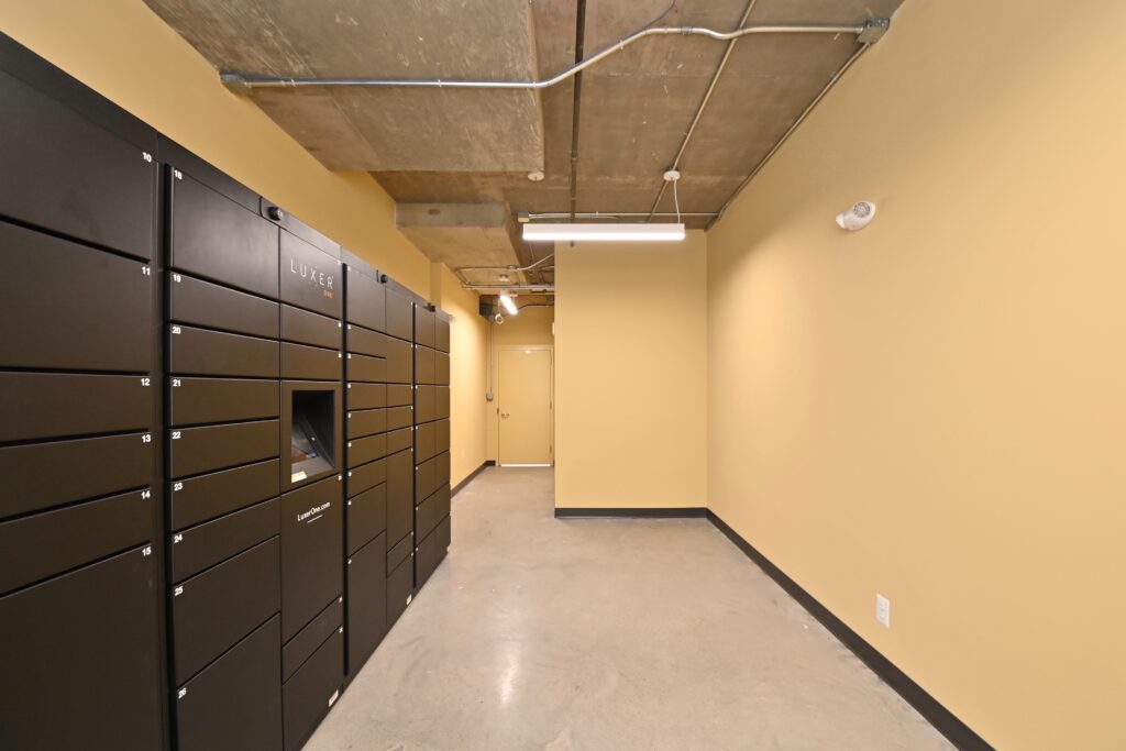 Package room with LED lighting and parcel lockers